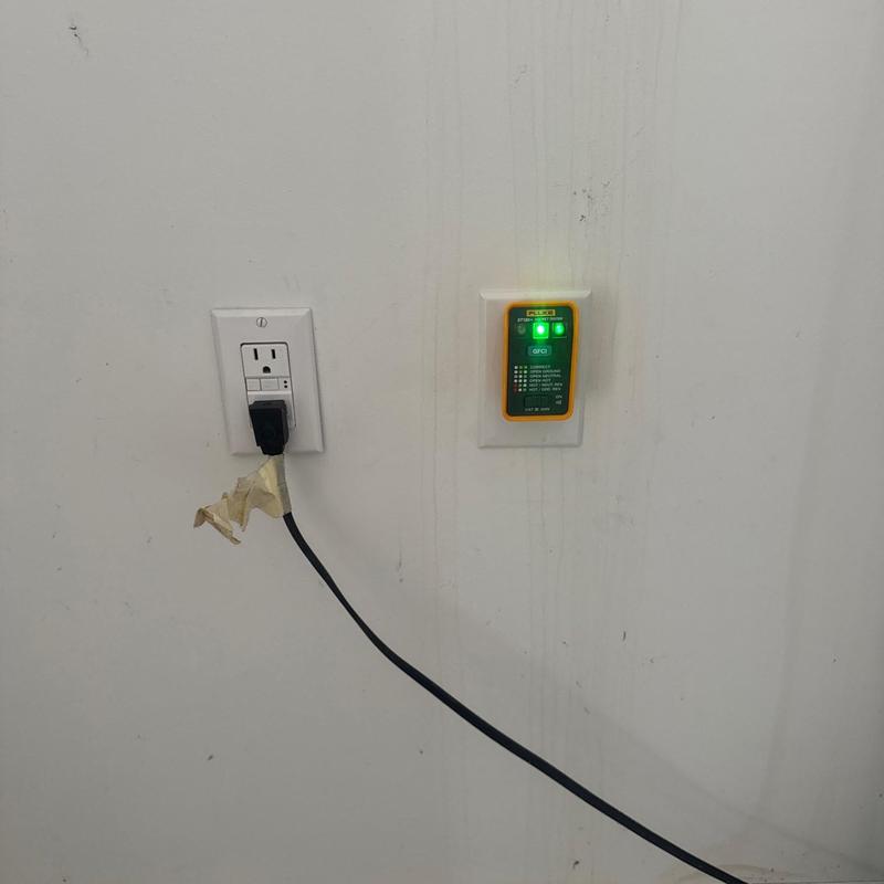 GFCI outlet with electrical tester and power cord