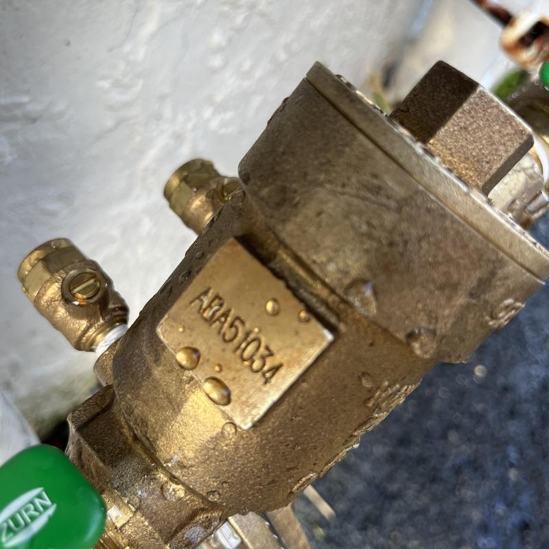 Wilkins 975XL2 backflow preventer with water droplets