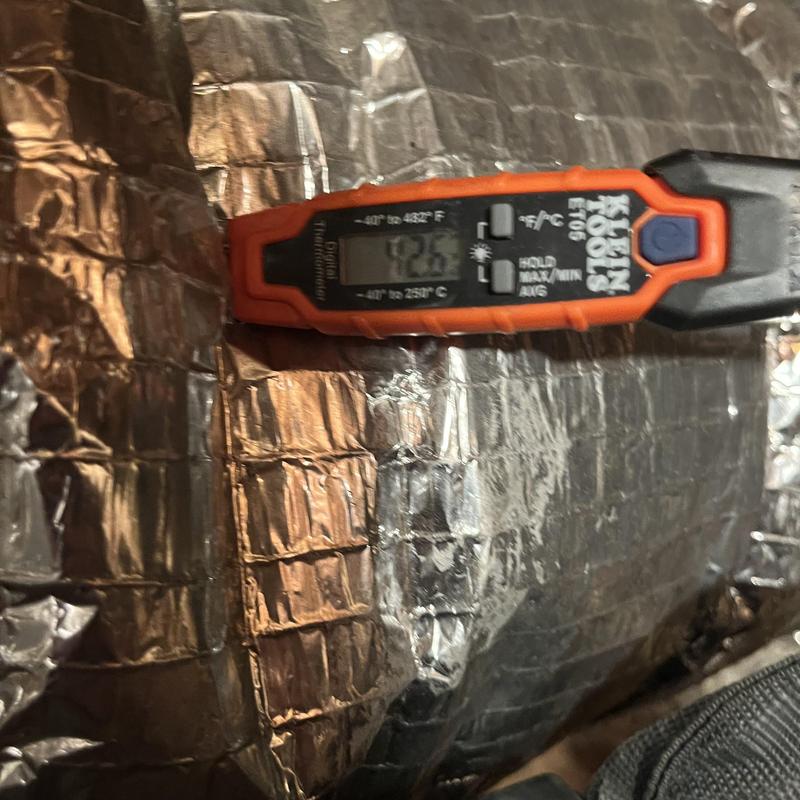 Insulated HVAC duct temperature measured with digital meter
