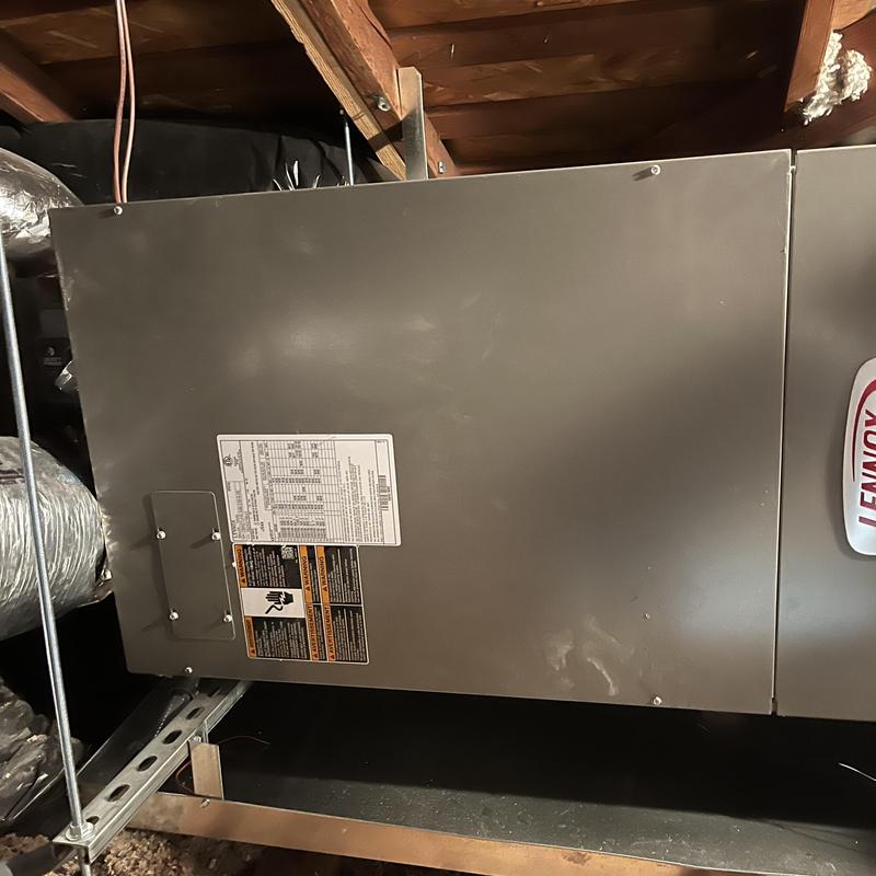 Lennox air handler unit in attic during maintenance