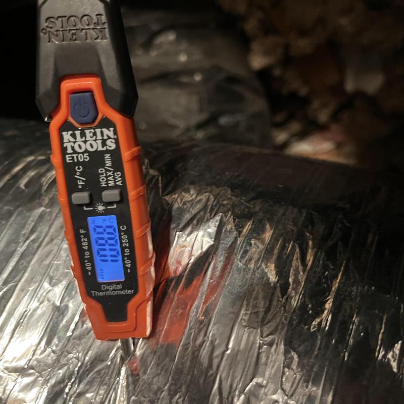 Duct insulation temperature check with digital thermometer