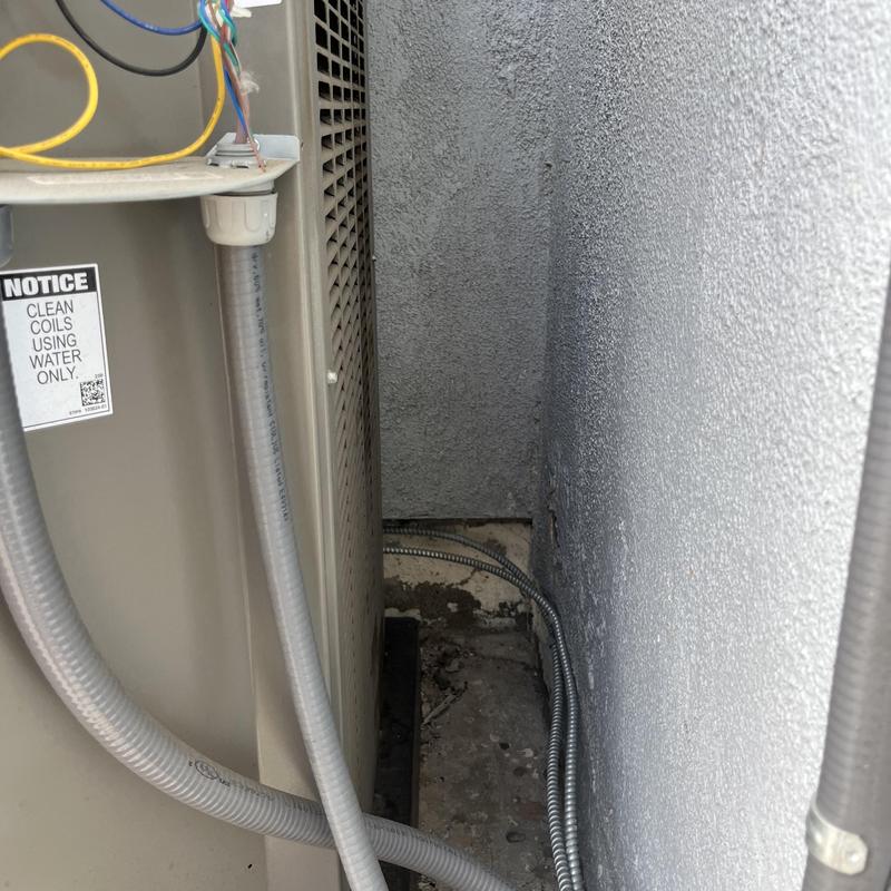 HVAC outdoor unit coil and wiring maintenance inspection