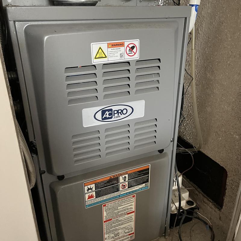 Furnace unit with warning labels and vent panel Furnace unit with warning labels and vent panel