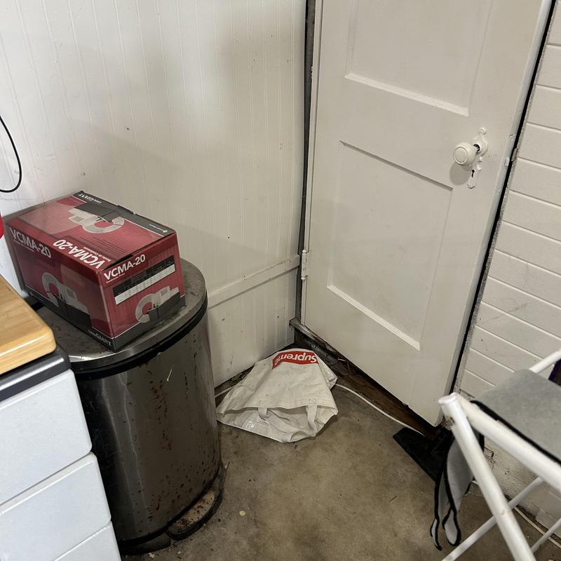 Condensate pump near door in utility room Condensate pump near door in utility room