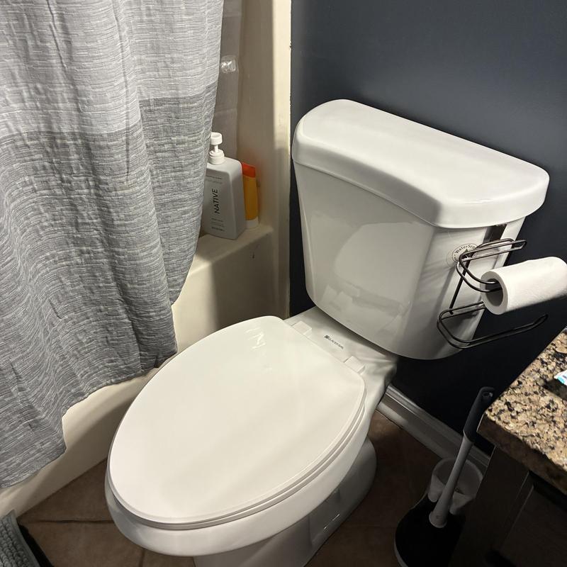 Toilet installation with repaired toilet flange in bathroom