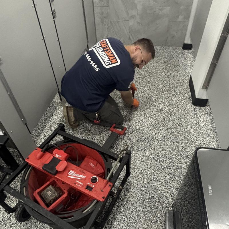 Floor drain unclogging in commercial restroom flooring