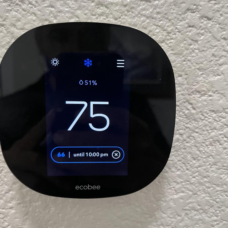 Ecobee thermostat display showing temperature settings
