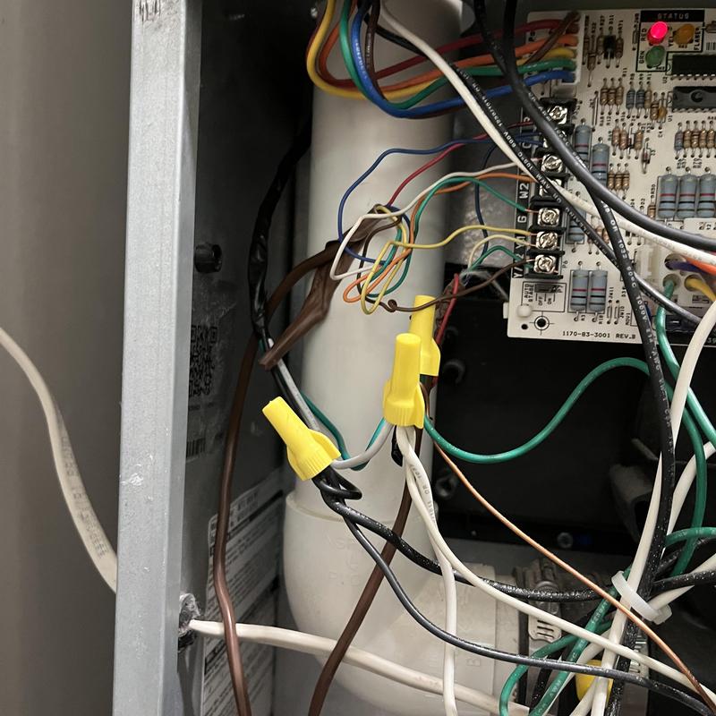 Thermostat wiring connections inside HVAC control panel