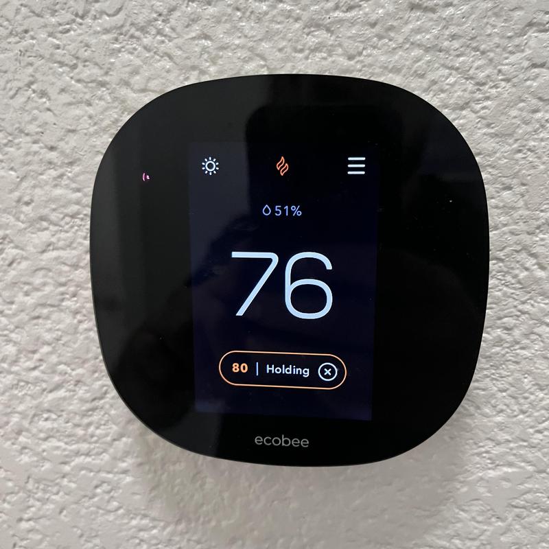 Ecobee thermostat display showing active heating mode