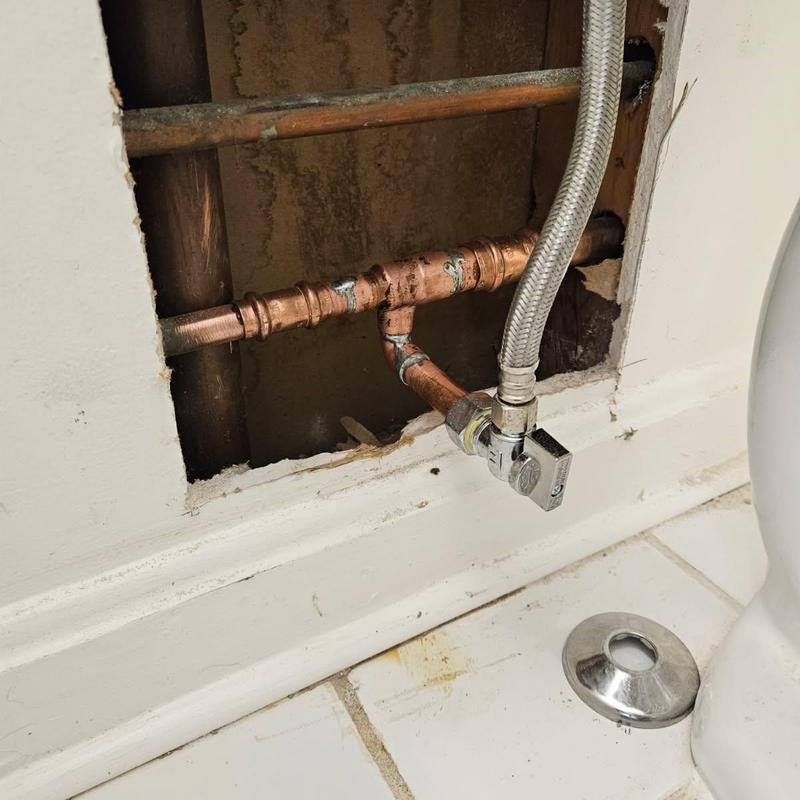Copper water line with valve and flexible hose installation