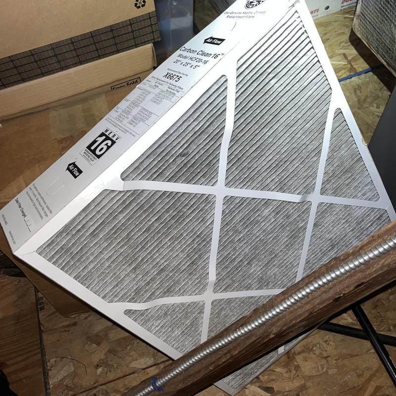 Air conditioner MERV 16 filter replacement on floor Air conditioner MERV 16 filter replacement on floor