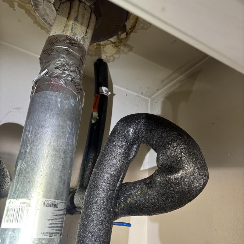 Insulated plumbing pipe with repaired duct tape seal