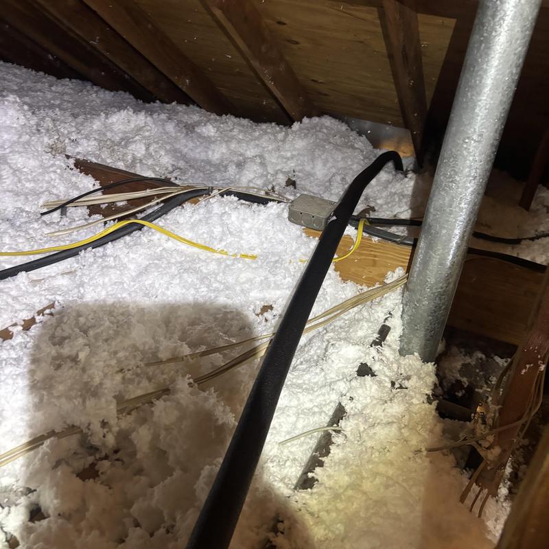 Pex water line routed through attic insulation