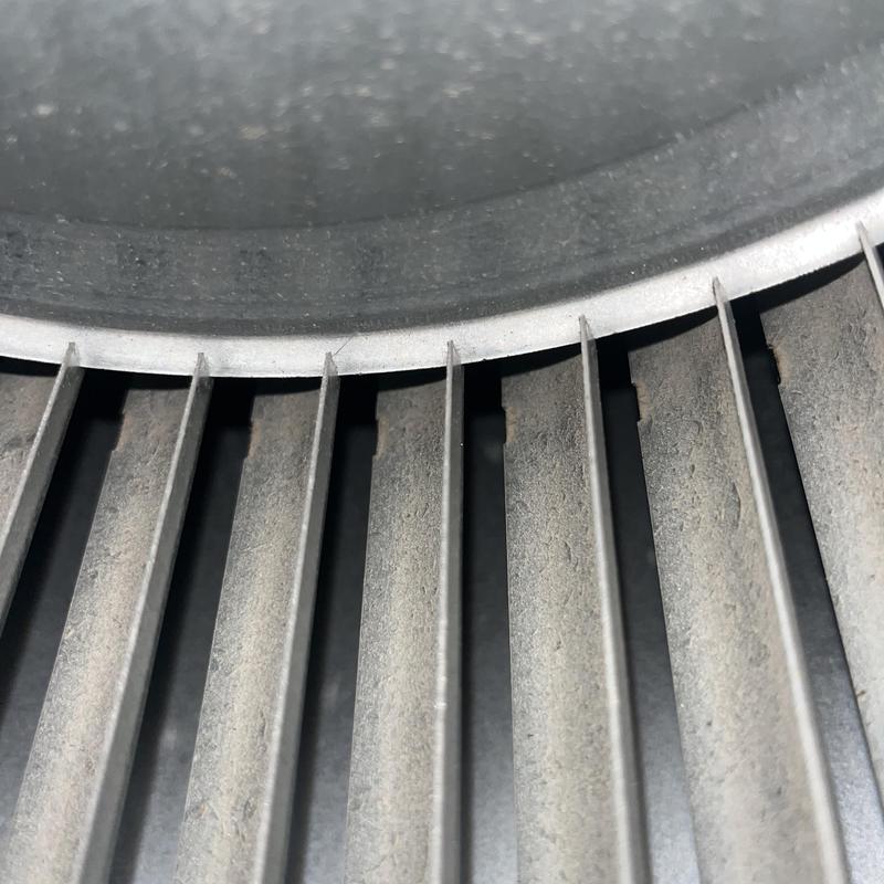 HVAC blower wheel with dust buildup during maintenance HVAC blower wheel with dust buildup during maintenance