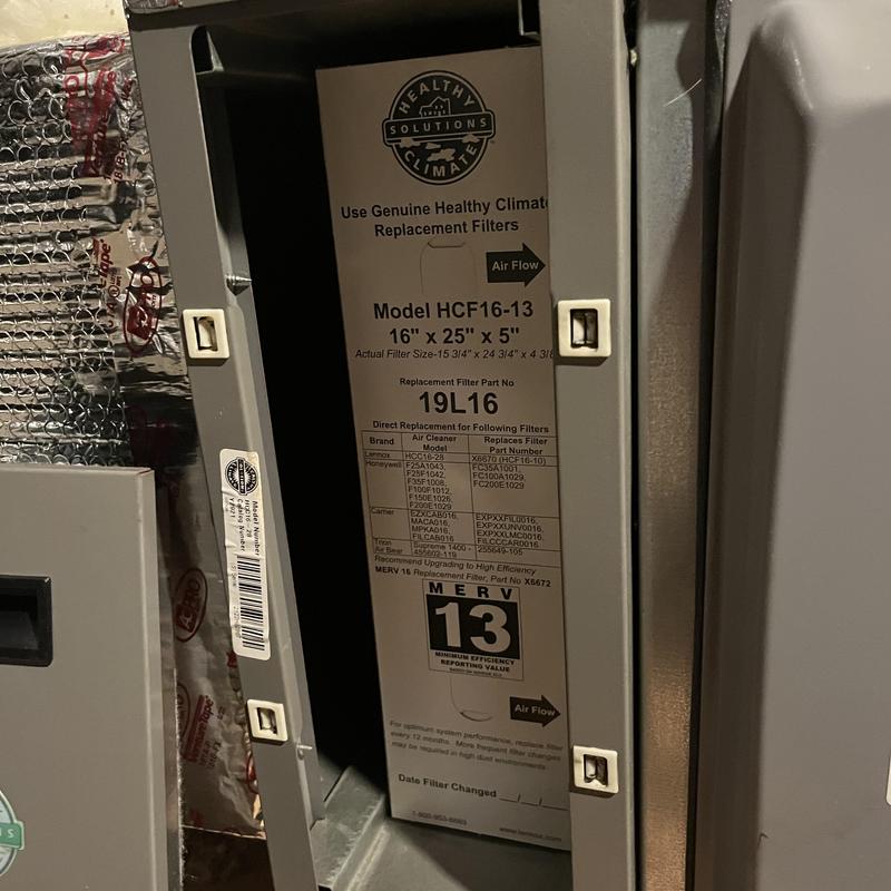 Air filter replacement in HVAC system cabinet