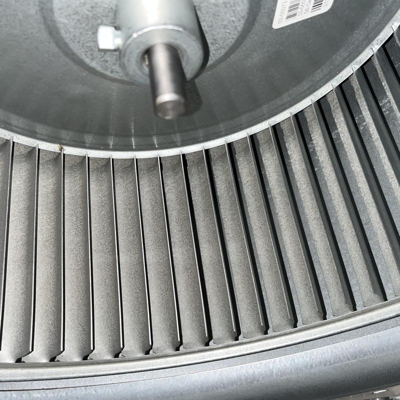 HVAC blower wheel close-up during seasonal maintenance HVAC blower wheel close-up during seasonal maintenance