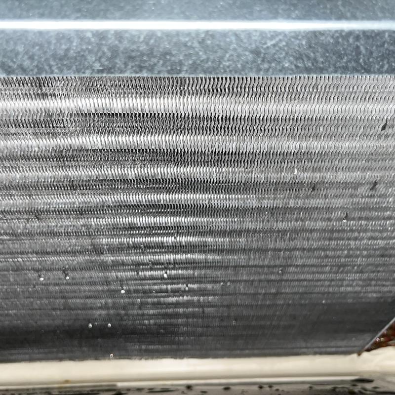 Air conditioner evaporator coil close-up during maintenance Air conditioner evaporator coil close-up during maintenance