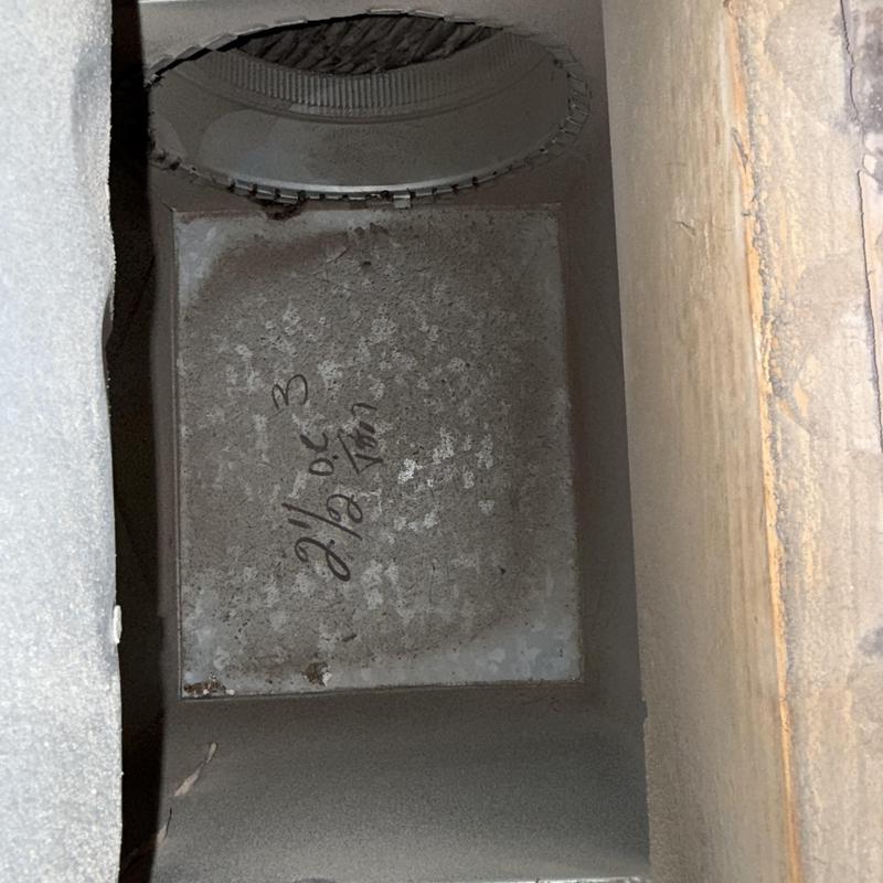 HVAC ductwork interior showing dust buildup before cleaning