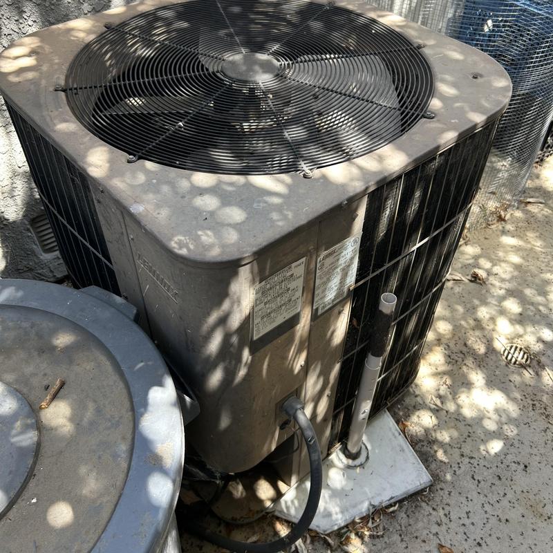 EL18KCV condenser unit outside home