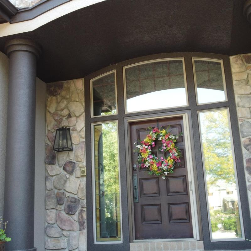 Front door and trim exterior repaint with dark bronze paint Front door and trim exterior repaint with dark bronze paint