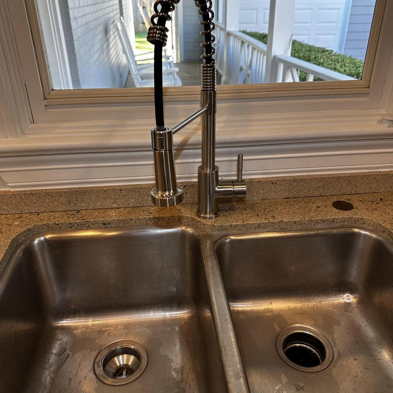 Kitchen sink with high-arc spring faucet installation