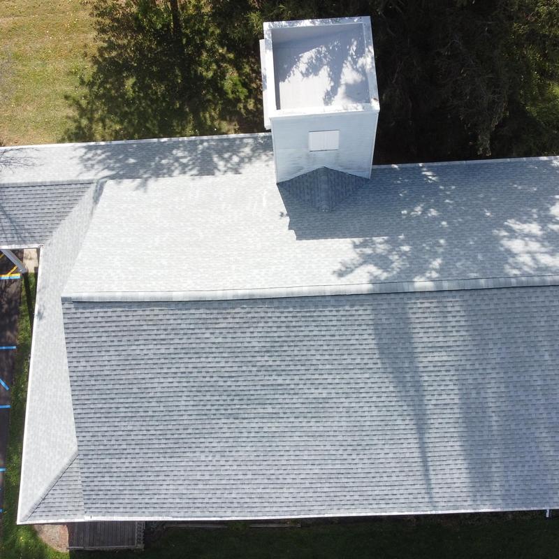 GAF Timberline HDZ asphalt shingle roof with chimney cap GAF Timberline HDZ asphalt shingle roof with chimney cap