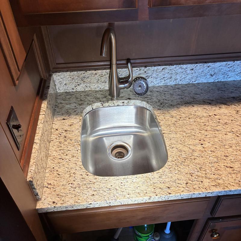 Bar sink drain with faucet and granite counter