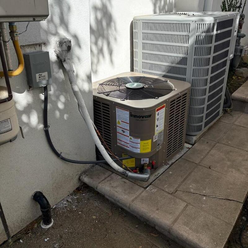 Innovair heat pump system installed outdoors