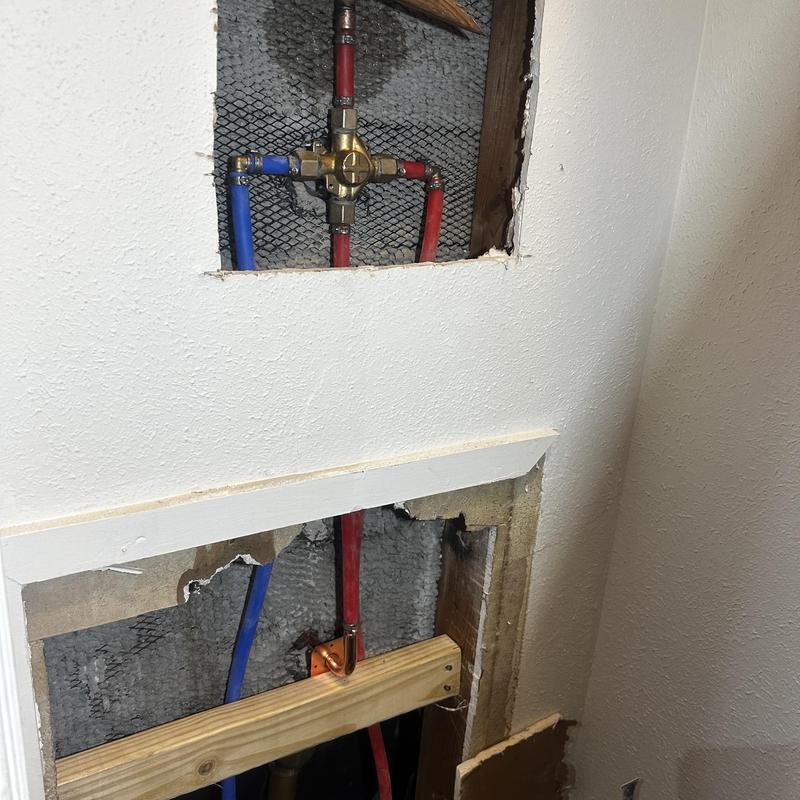 Shower and tub valve installation with plumbing lines