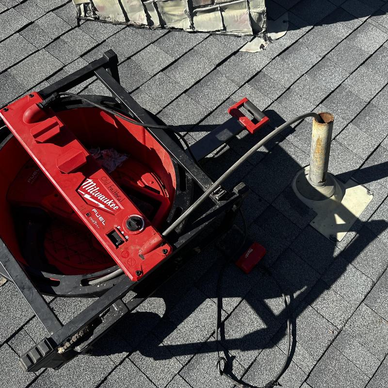 Roof vent stack main line clog cleaning equipment