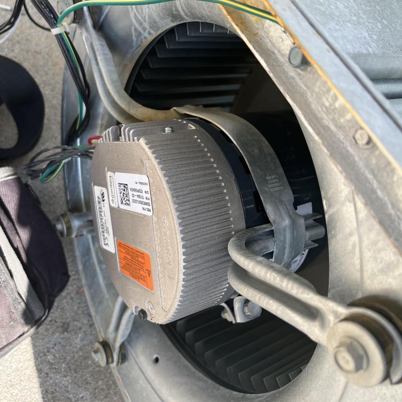 Blower motor installed in HVAC unit housing