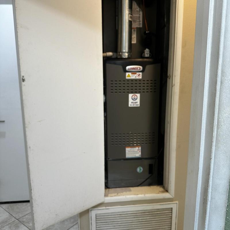 Lennox indoor furnace installed in wall closet Lennox indoor furnace installed in wall closet