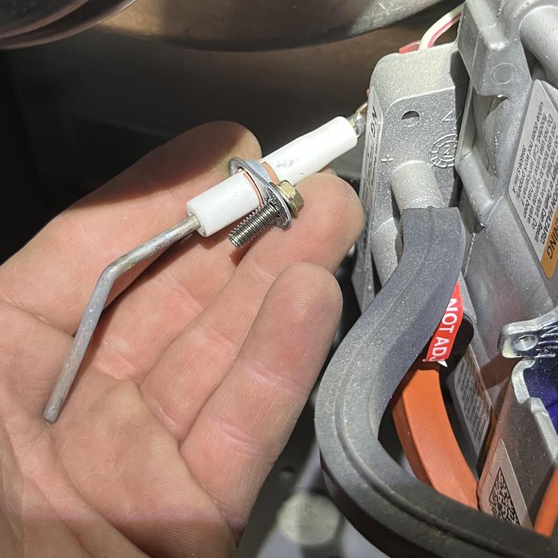 Igniter sensor held near HVAC furnace component