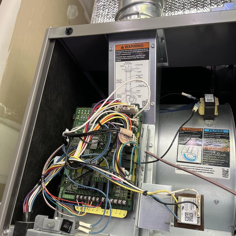 Furnace control board with wiring and blower motor