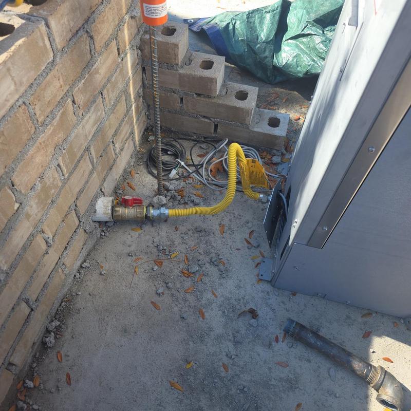 Flexible gas line connection to HVAC unit outdoors