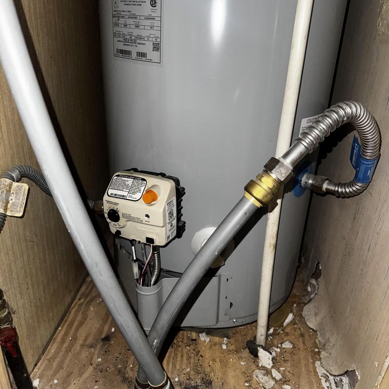 Water heater pilot assembly and gas line connections