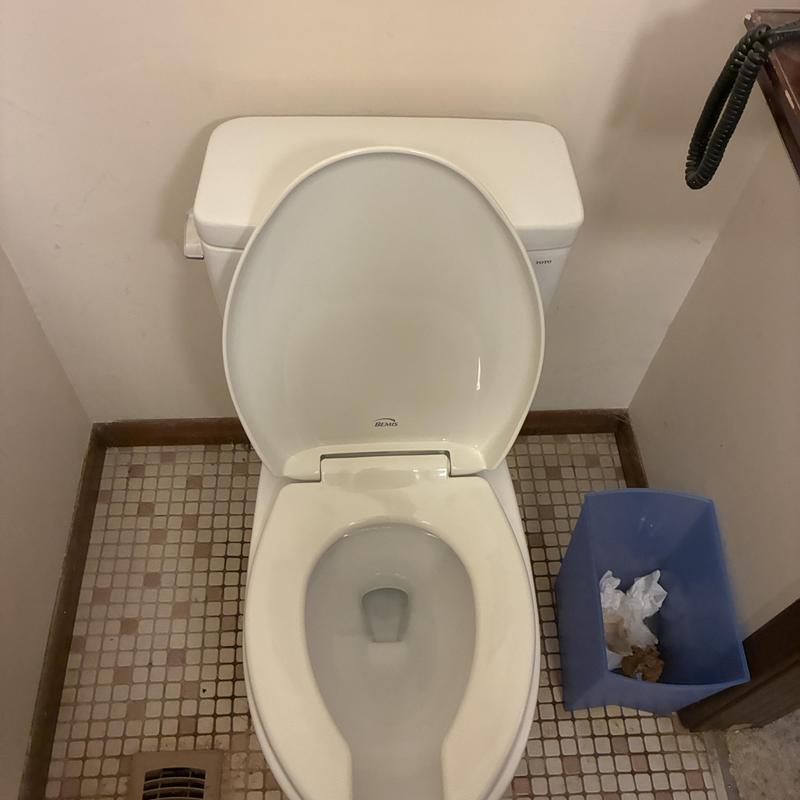 ADA compliant flush toilet with open lid installation