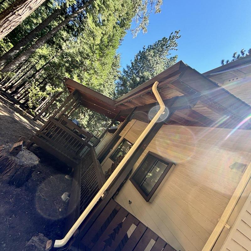 Steel seamless gutter with Leaf Blaster guards on home Steel seamless gutter with Leaf Blaster guards on home