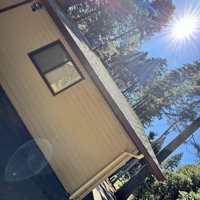 Steel seamless gutters with Leaf Blaster guards on home Steel seamless gutters with Leaf Blaster guards on home