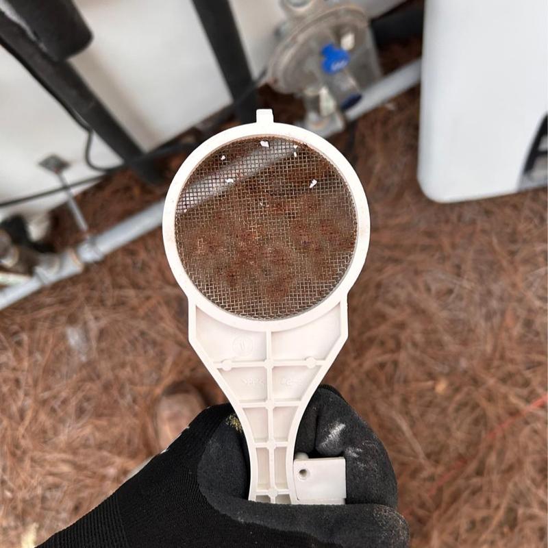 Tankless water heater vent exhaust screen cleaning