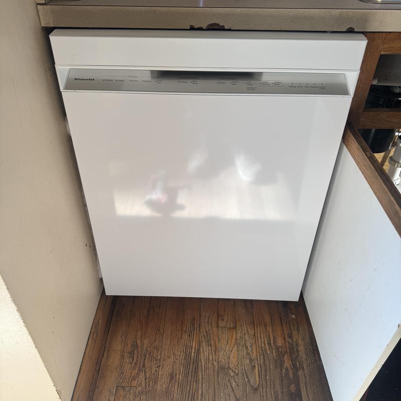 Dishwasher installation in kitchen cabinet space