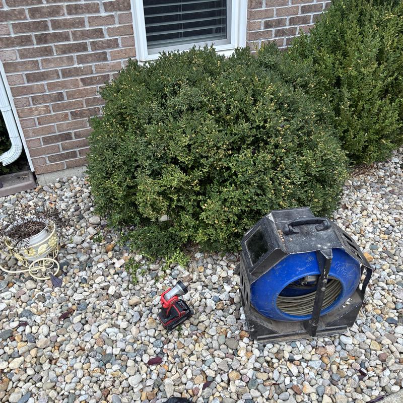 Sewer line video inspection camera with drill on gravel