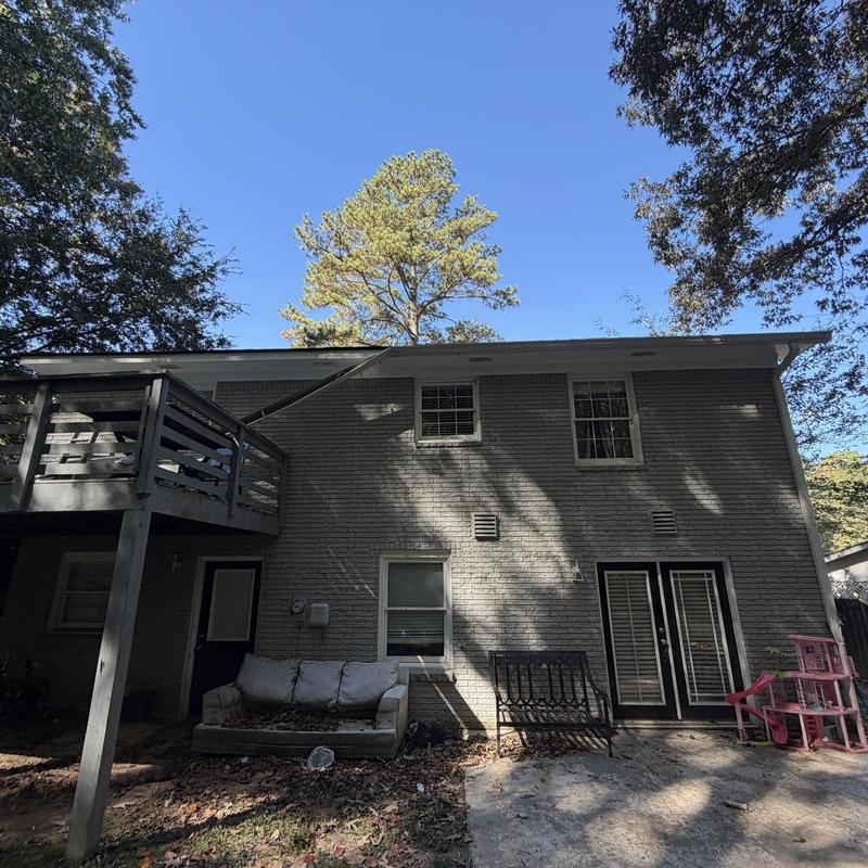 White 6-inch gutters on two-story brick house