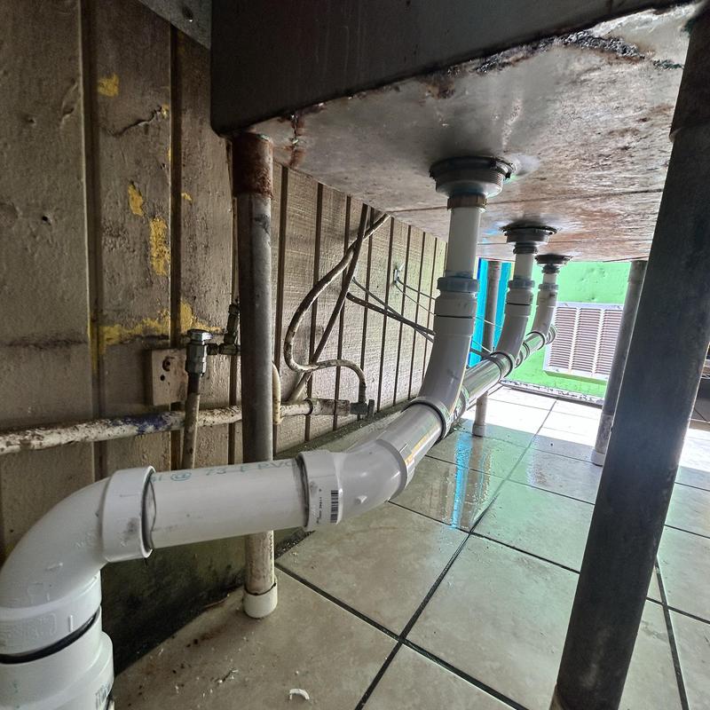 Triple compartment sink drain PVC piping installation