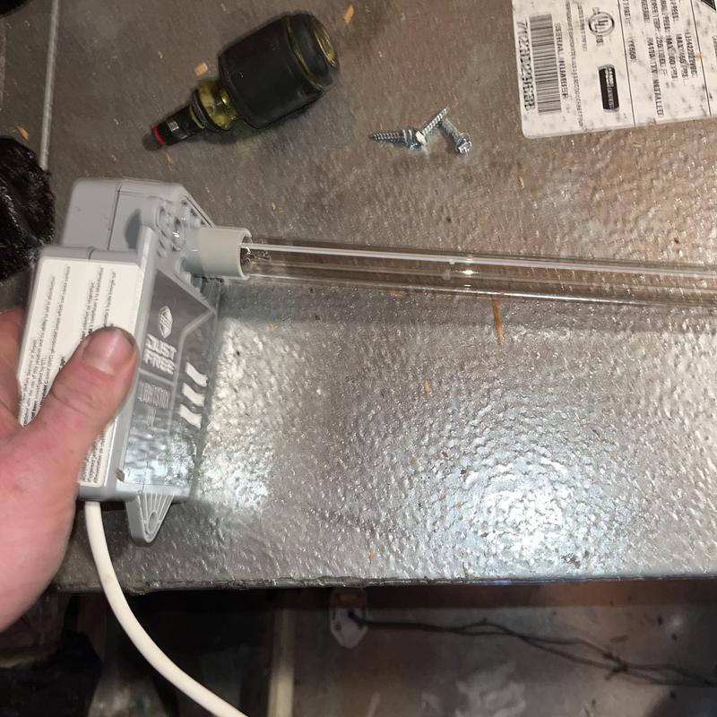 UV light air purifier bulb installation in HVAC system