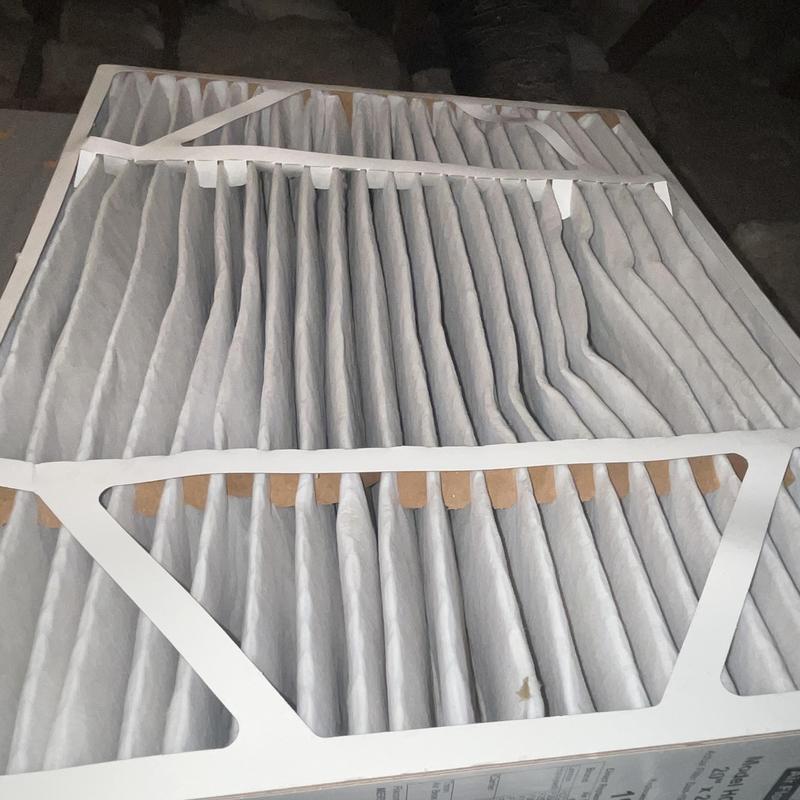 HVAC air filter with bent pleats during maintenance