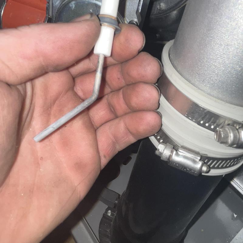 Flame sensor hand inspection on furnace pipe connection