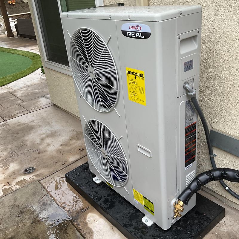 Lennox HVAC condenser unit installation outdoors