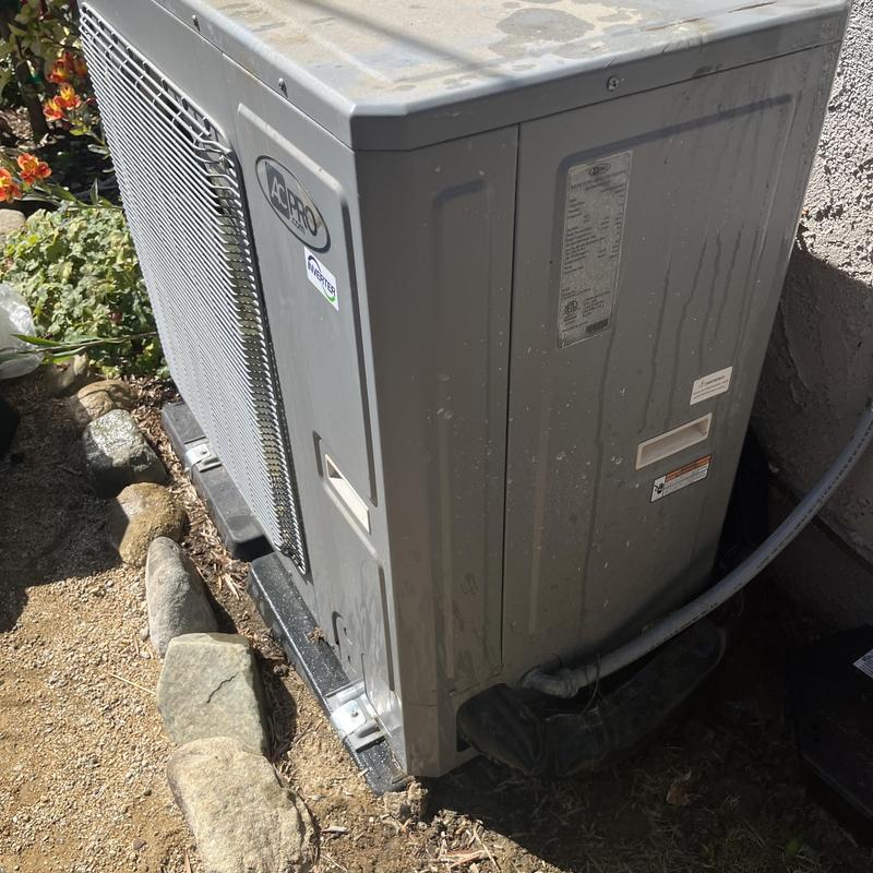 Air conditioner unit exterior with wiring during maintenance