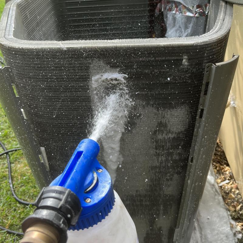 Condenser coil cleaning with spray bottle in Burbank